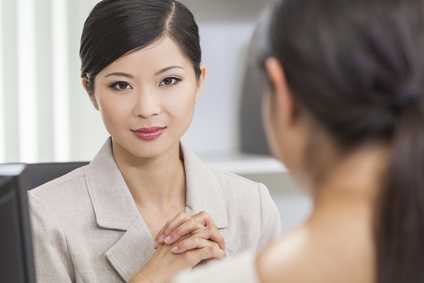 Asian Chinese Woman or Businesswoman in Meeting